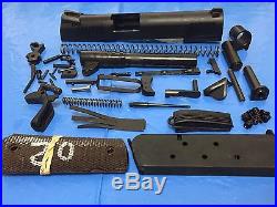 Complete 1911 pistol Parts Kit Build. 45 Tactical model with mag