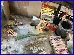 Lot of vintage Cox R/C model airplane engine parts supplies tools etc