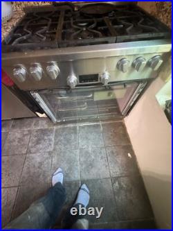 Miele gas range model number HR 1134 5 stove knobs and 1 oven knob