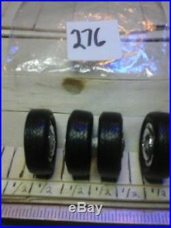 Model car parts 4 chrome rims with tires. 1 / 25 scale